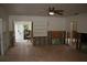 Living area under renovation with exposed walls and flooring at 144 Garden Ln, Sarasota, FL 34242