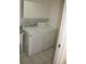 Laundry room with washer and dryer included at 144 Garden Ln, Sarasota, FL 34242