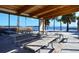 Relaxing waterfront picnic pavilion with shaded tables and benches at 3808 Gulf Of Mexico Dr # E307, Longboat Key, FL 34228