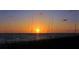 Stunning sunset over the ocean, viewed from the beach at 3808 Gulf Of Mexico Dr # E307, Longboat Key, FL 34228