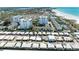 Aerial view of community near beach with pool at 1048 W Peppertree Ln # 118B, Sarasota, FL 34242