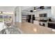 Modern kitchen with breakfast bar at 12 Golfview Rd, Rotonda West, FL 33947