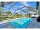 Inviting screened pool area with spacious deck at 12 Golfview Rd, Rotonda West, FL 33947