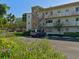 Condo building with parking and beautiful landscaping at 4480 Ironwood Cir # 202A, Bradenton, FL 34209