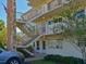 Exterior view of condo building stairwell and entrance at 4480 Ironwood Cir # 202A, Bradenton, FL 34209