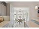 Bright kitchen nook with a round table and chairs, bathed in sunlight at 5296 White Sand Ne Cir, St Petersburg, FL 33703