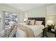 Main bedroom with king-size bed and access to private patio at 5296 White Sand Ne Cir, St Petersburg, FL 33703