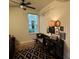 Charming bedroom with large window and decorative rug at 7937 St Simons St # 7937, University Park, FL 34201