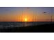 Stunning sunset over the ocean at 114 31St St, Holmes Beach, FL 34217