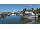 Boats docked at a marina on a sunny day at 114 31St St, Holmes Beach, FL 34217