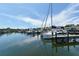 Boats docked at a marina on a sunny day at 114 31St St, Holmes Beach, FL 34217