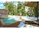 Private, heated pool with deck and lounge chairs at 114 31St St, Holmes Beach, FL 34217