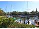 Stunning marina view with numerous boats docked at 1717 Pelican Cove Rd # 334, Sarasota, FL 34231