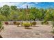 Brick courtyard with potted plants and American flag at 33 S Gulfstream Ave # 307, Sarasota, FL 34236