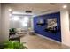 Modern condo lobby with blue accent wall and seating at 33 S Gulfstream Ave # 307, Sarasota, FL 34236