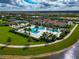 Aerial view of community pool, tennis courts and clubhouse at 4950 Kiva Cir, Bradenton, FL 34211