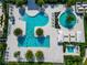 Aerial view of resort-style pool with multiple pools and lounge areas at 4950 Kiva Cir, Bradenton, FL 34211