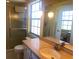 Bathroom with single vanity, shower and toilet at 449 Botticelli Dr # 449, Nokomis, FL 34275