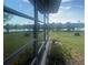 View of the exterior featuring large windows and lake view at 449 Botticelli Dr # 449, Nokomis, FL 34275
