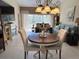 Charming dining area with a round table and seating for four at 7225 Cedar Hollow Cir # 20-201, Bradenton, FL 34203