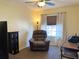 Relaxing home office with a recliner and workspace at 7225 Cedar Hollow Cir # 20-201, Bradenton, FL 34203