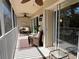 Spacious screened lanai with seating and views of nature at 7225 Cedar Hollow Cir # 20-201, Bradenton, FL 34203