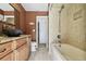 Bathroom with beige tile and a bathtub at 117 Hillcrest Dr, Bradenton, FL 34209