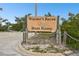 Warner's Bayou boat ramp sign in Manatee County, Florida at 117 Hillcrest Dr, Bradenton, FL 34209