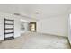 Bright living room with white walls, carpet, and pool view at 117 Hillcrest Dr, Bradenton, FL 34209