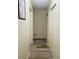 Clean hallway with hardwood floors and access to bedrooms at 2549 Arapaho St, Sarasota, FL 34231