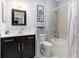 Main bathroom with a bathtub, toilet and single vanity at 5450 Fairfield Blvd, Bradenton, FL 34203