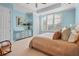 Light and airy bedroom with a comfortable bed and plenty of natural light at 8480 Big Buck Ln, Sarasota, FL 34240