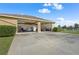 Spacious garage interior with high ceilings and ample space for vehicles and storage at 8480 Big Buck Ln, Sarasota, FL 34240