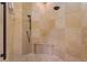 Spacious shower with built-in seat and mosaic tile accents at 8480 Big Buck Ln, Sarasota, FL 34240