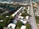 Aerial view of community showing building layout and pool at 5310 26Th W St # 2703, Bradenton, FL 34207