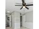 Bedroom with ceiling fan and access to bathroom at 5310 26Th W St # 2703, Bradenton, FL 34207
