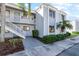 Condo building exterior showcasing entrance and landscaping at 5310 26Th W St # 2703, Bradenton, FL 34207