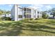 Exterior view of building showcasing landscaping and parking at 5310 26Th W St # 2703, Bradenton, FL 34207