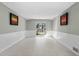 Bright living room with tile floors and sliding glass doors at 5310 26Th W St # 2703, Bradenton, FL 34207