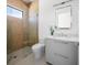 Modern bathroom with a glass shower and light wood vanity at 1212 Center Pl, Sarasota, FL 34236