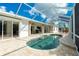 Escape to your own backyard oasis with this kidney-shaped pool at 2629 Rolling Rd, North Port, FL 34288