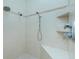 Large walk-in shower with dual shower heads and built-in bench seating at 2629 Rolling Rd, North Port, FL 34288