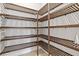 Walk-in pantry with ample shelving for storage at 333 Bocelli Dr, Nokomis, FL 34275