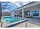 Luxury pool and spa with covered patio at 333 Bocelli Dr, Nokomis, FL 34275