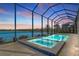 Expansive pool and spa with lake view at 333 Bocelli Dr, Nokomis, FL 34275