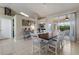 Dining area with a large wooden table and six chairs at 4135 Dover E Dr, Bradenton, FL 34203