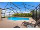 Inviting screened-in pool with plenty of lounge space at 4135 Dover E Dr, Bradenton, FL 34203