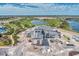 Aerial view of community clubhouse and golf course at 3121 Tolmino Ct, Bradenton, FL 34211