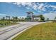 Gated community entrance with landscaping at 3121 Tolmino Ct, Bradenton, FL 34211