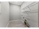 Laundry room with tile floor and wire shelving at 3121 Tolmino Ct, Bradenton, FL 34211